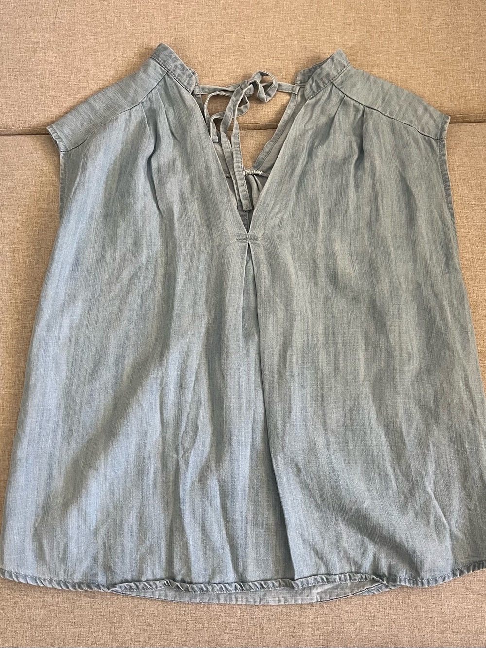 denim sleeveless top with tie detail